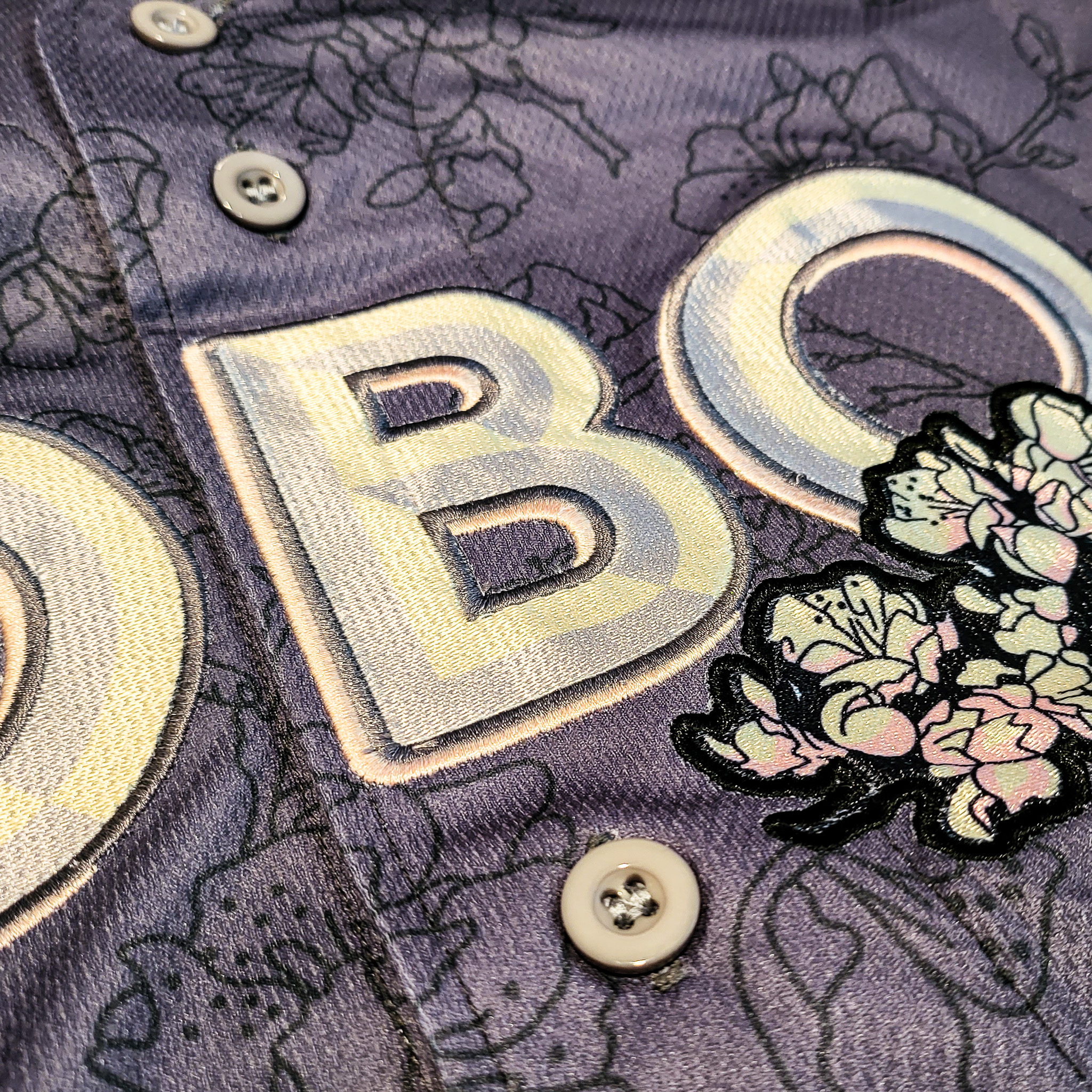 Combined sublimation and embroidery sample